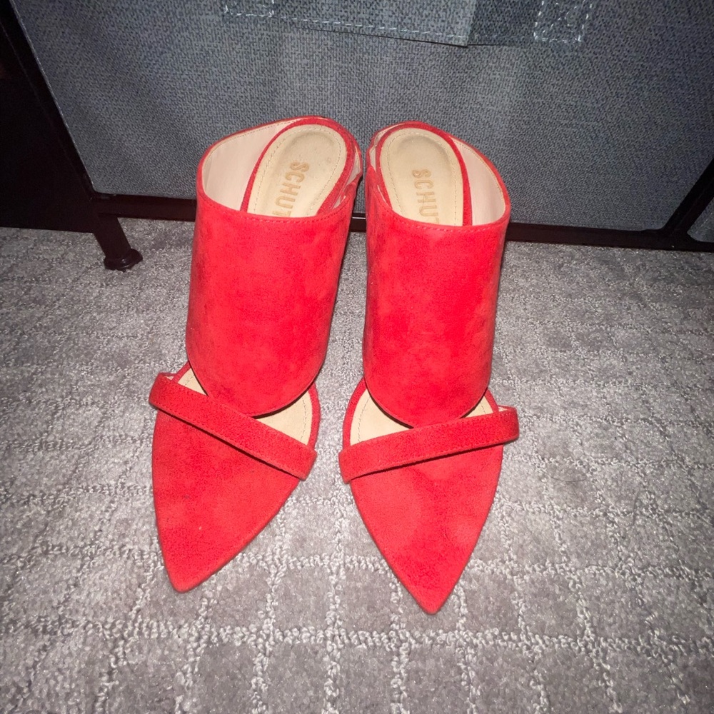 Red suede pointy toe mules